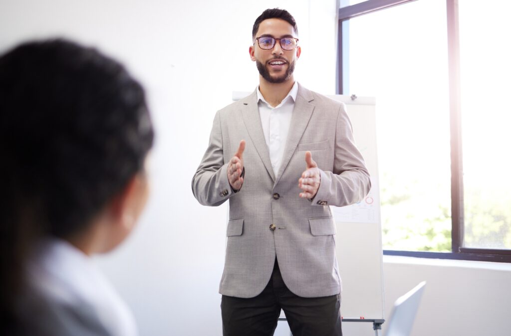 Young professional making a sales pitch